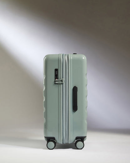 Medium Luggage in Mist Blue Gloss - Icon Stripe