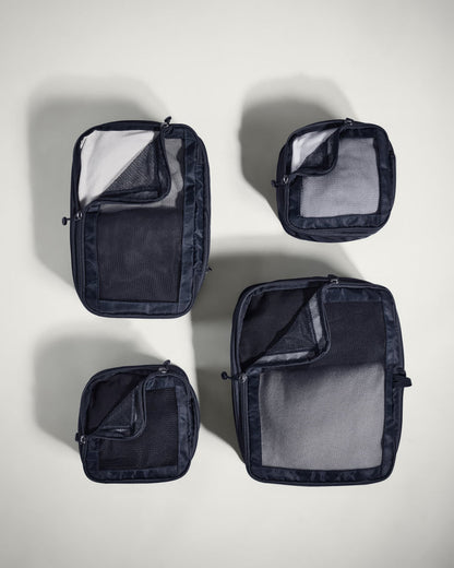 several black bags with mesh pockets
